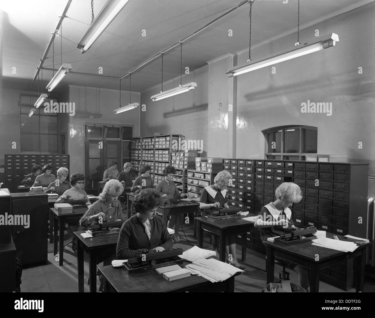 Tabulating machines in the punch room in a Sheffield Factory office, 1963.  Artist: Michael Walters Stock Photo