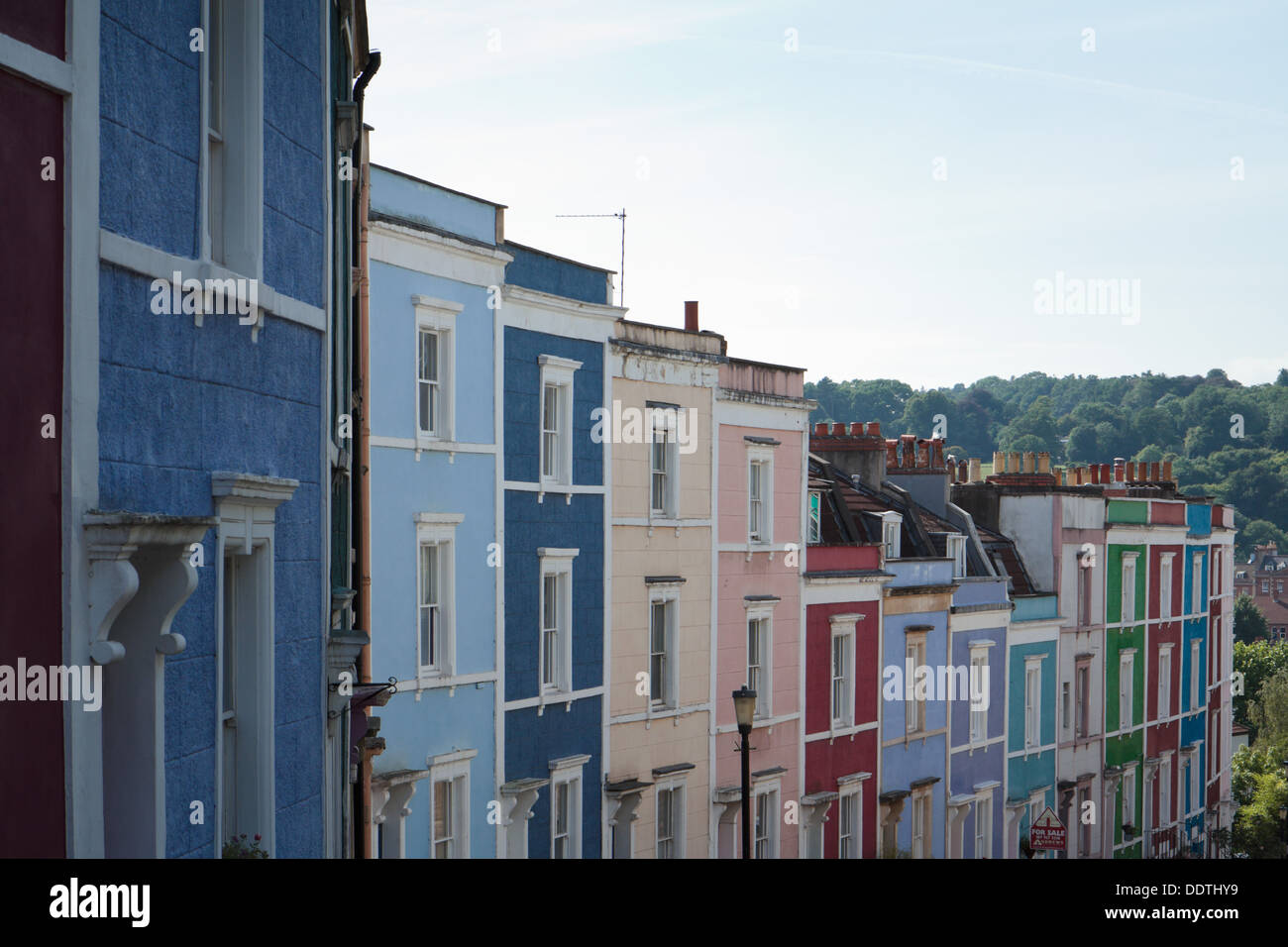Terrace of colourful painted Regency houses in Hotwells, Clifton