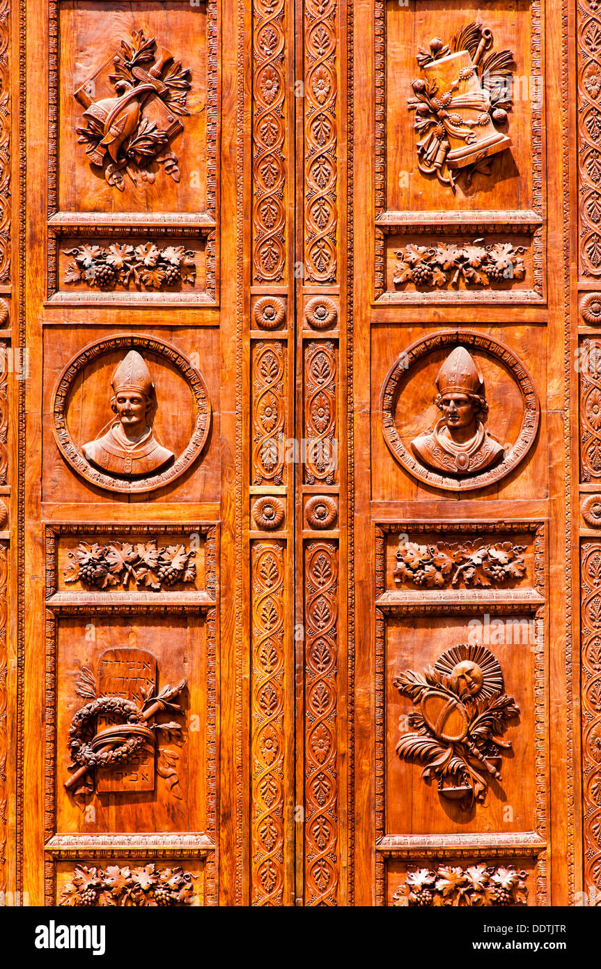 Carved wooden door catholic church hi-res stock photography and images