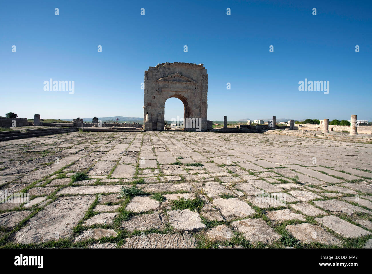 The forum and the Arch of Trajan at Mactaris, Tunisia. Artist: Samuel Magal Stock Photo