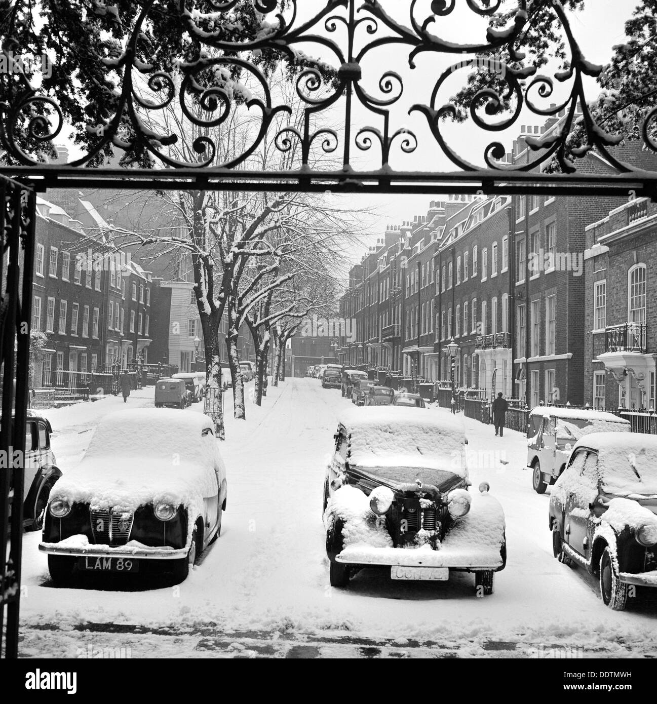 Snow-covered cars, Church Row, Hampstead, London, 1960-1965. Artist: John Gay Stock Photo