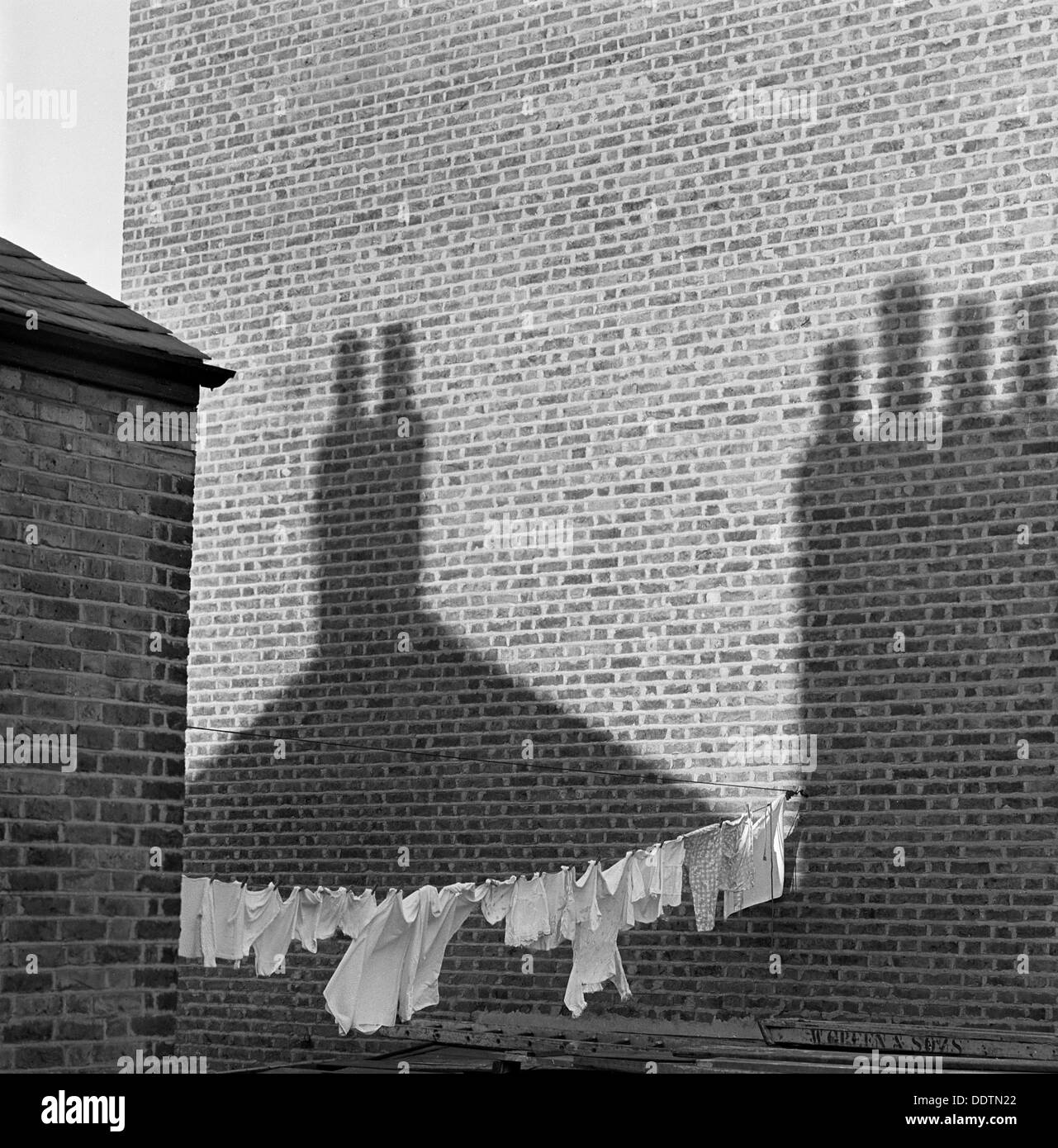 Shadows and laundry, London, 1964. Artist: John Gay Stock Photo
