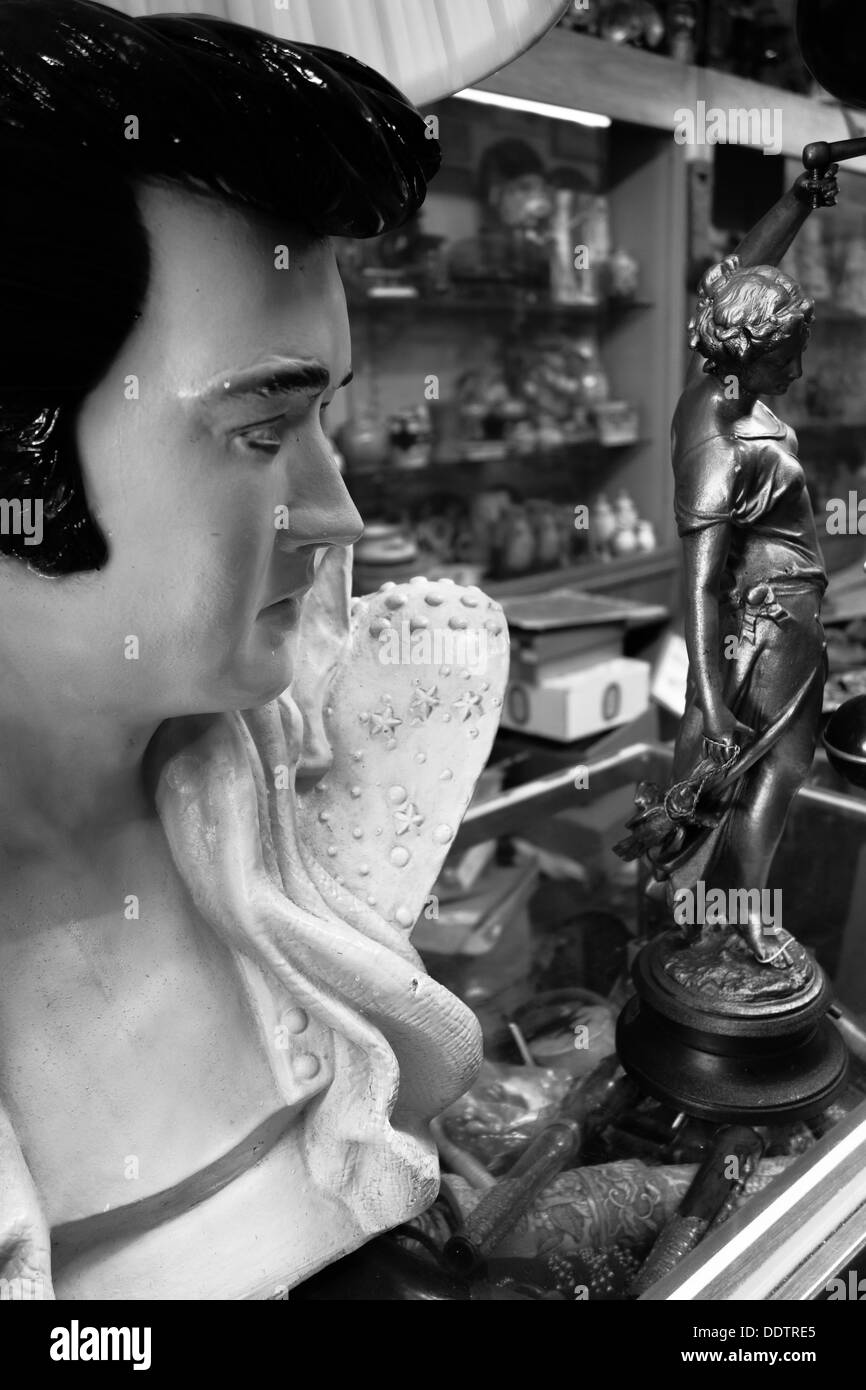 An Elvis Presley lamp in a Pittsburgh antique shop in black and white Stock Photo