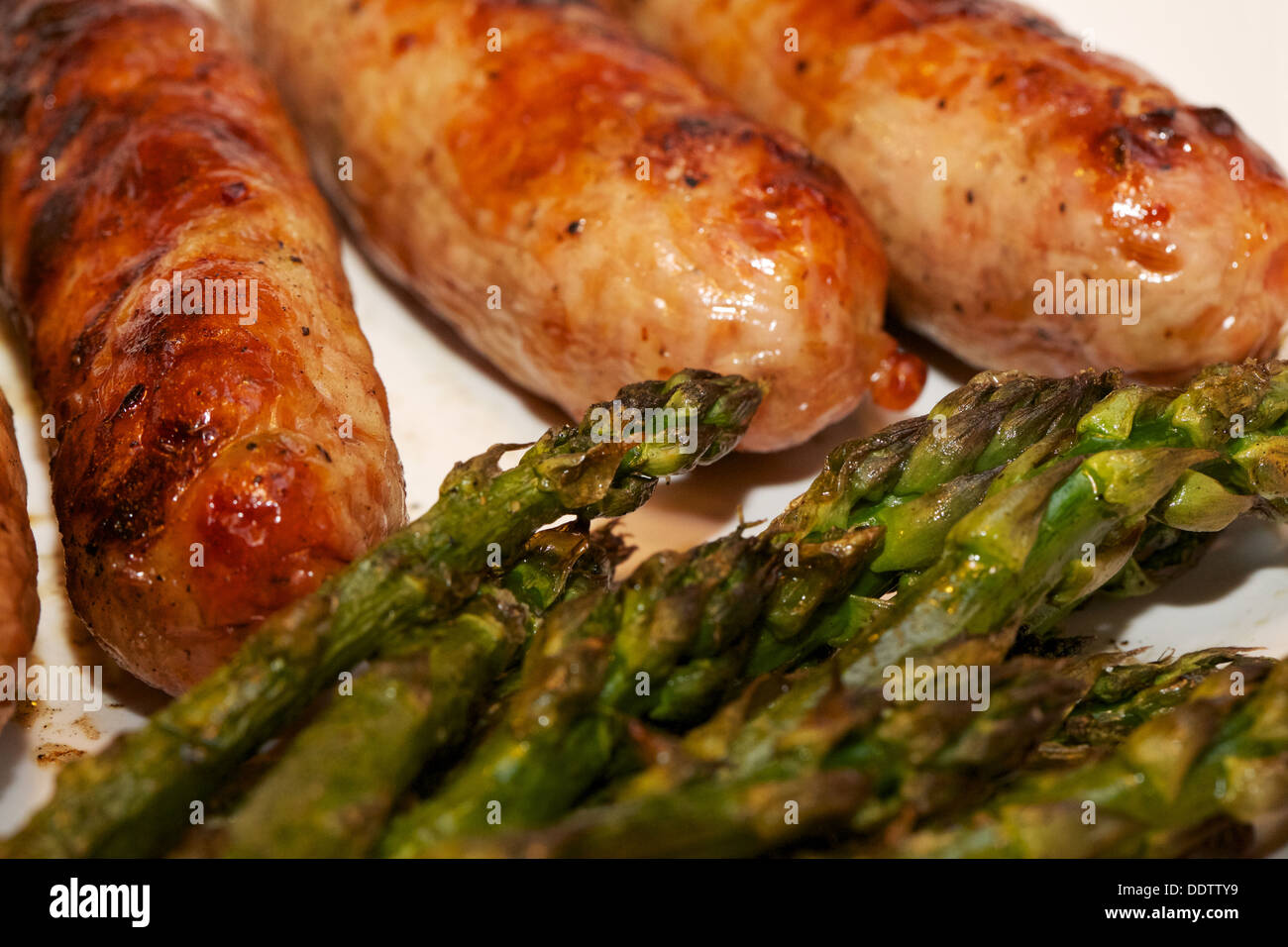 Grilled Italian sausage and asparagus Stock Photo Alamy