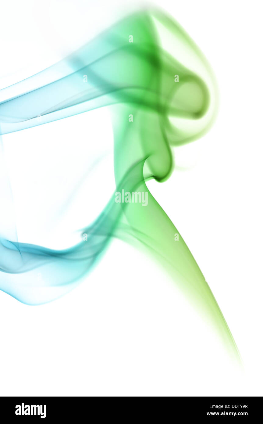 Blue and green smoke on white background Stock Photo - Alamy