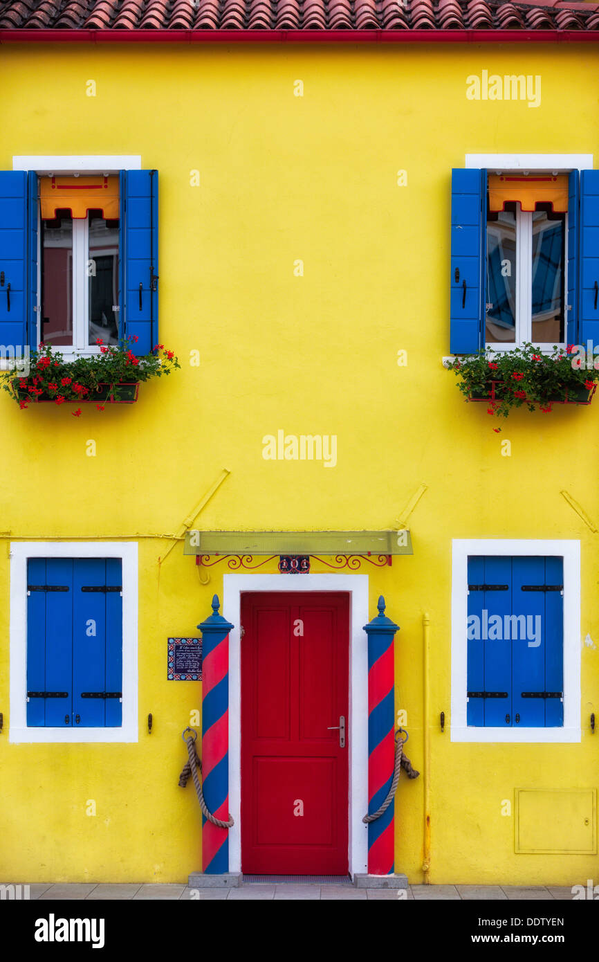 Burano House Facade With Brightly Painted Yellow Wall Red Door