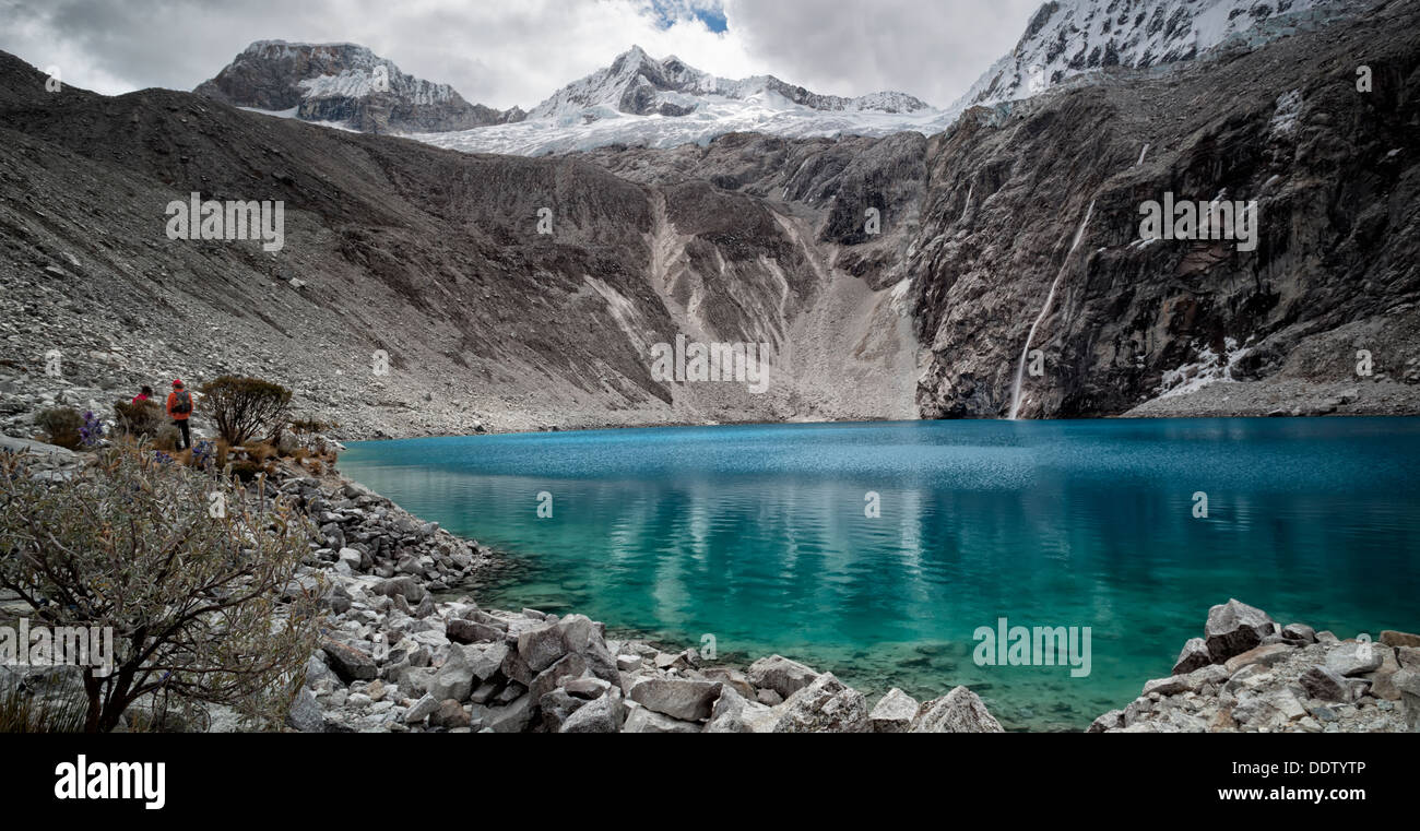 Laguna 69 with surrounding glaciers of Pisco East and Pisco West, waterfall into turquoise lake, Cordilleras, Peru Stock Photo