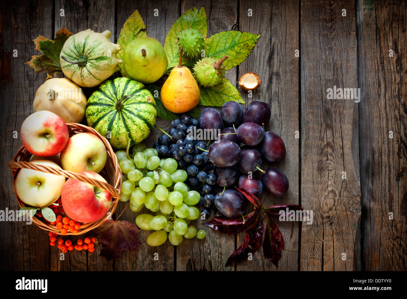 Fruits and vegetables in autumn season on vintage wooden boards Stock ...