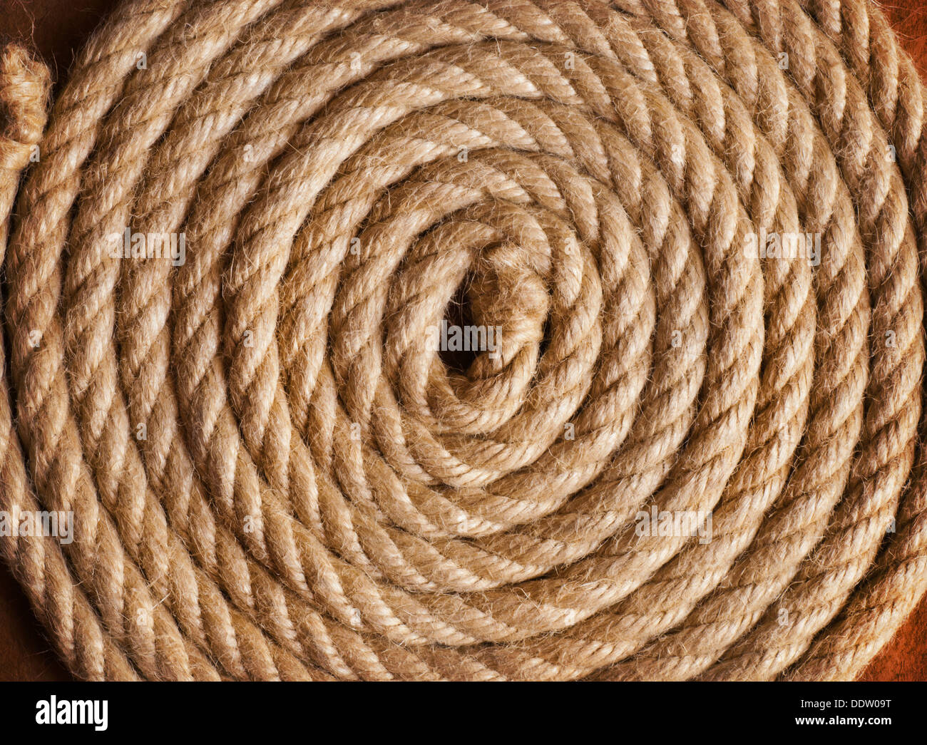 Aged Rope on the old paper background Stock Photo - Alamy