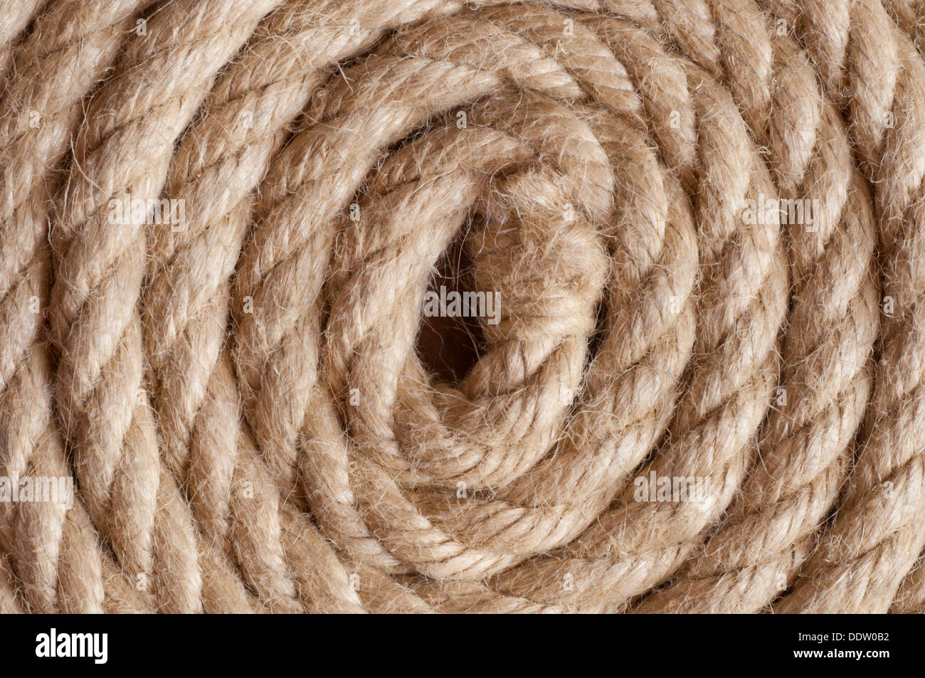 Aged Rope on the old paper background Stock Photo - Alamy