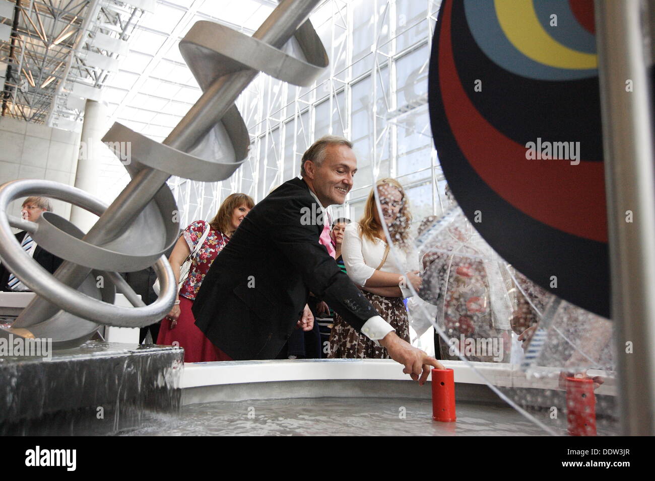 Gdynia, Poland 7th, September 2013 new building of the EXPERYMENT Science Centre opening ceremony. Experyment is a modern scientific and educational playground for amateur explorers and the 'learning through fun' philosophy followers of all ages. Mayor of Gdynia Wojciech Szczurek (L) took part in the ceremony Credit:  Michal Fludra/Alamy Live News Stock Photo