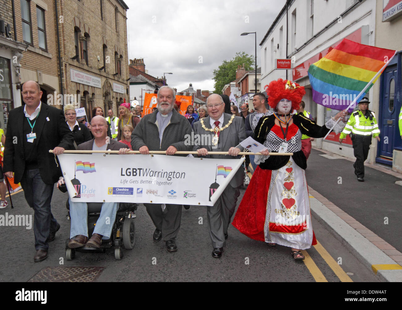 Warrington, Cheshire, UK. 7th September 2013. The annual Warrington LGBT parade and event has got off to a great start. The rain kept off as the mayor of Warrington, Wolves Rugby mascot Wolfie, local church leaders and spectators joined the carnival parade through Warrington Town Centre. Credit: Tony Smith/Alamy Live News Stock Photo