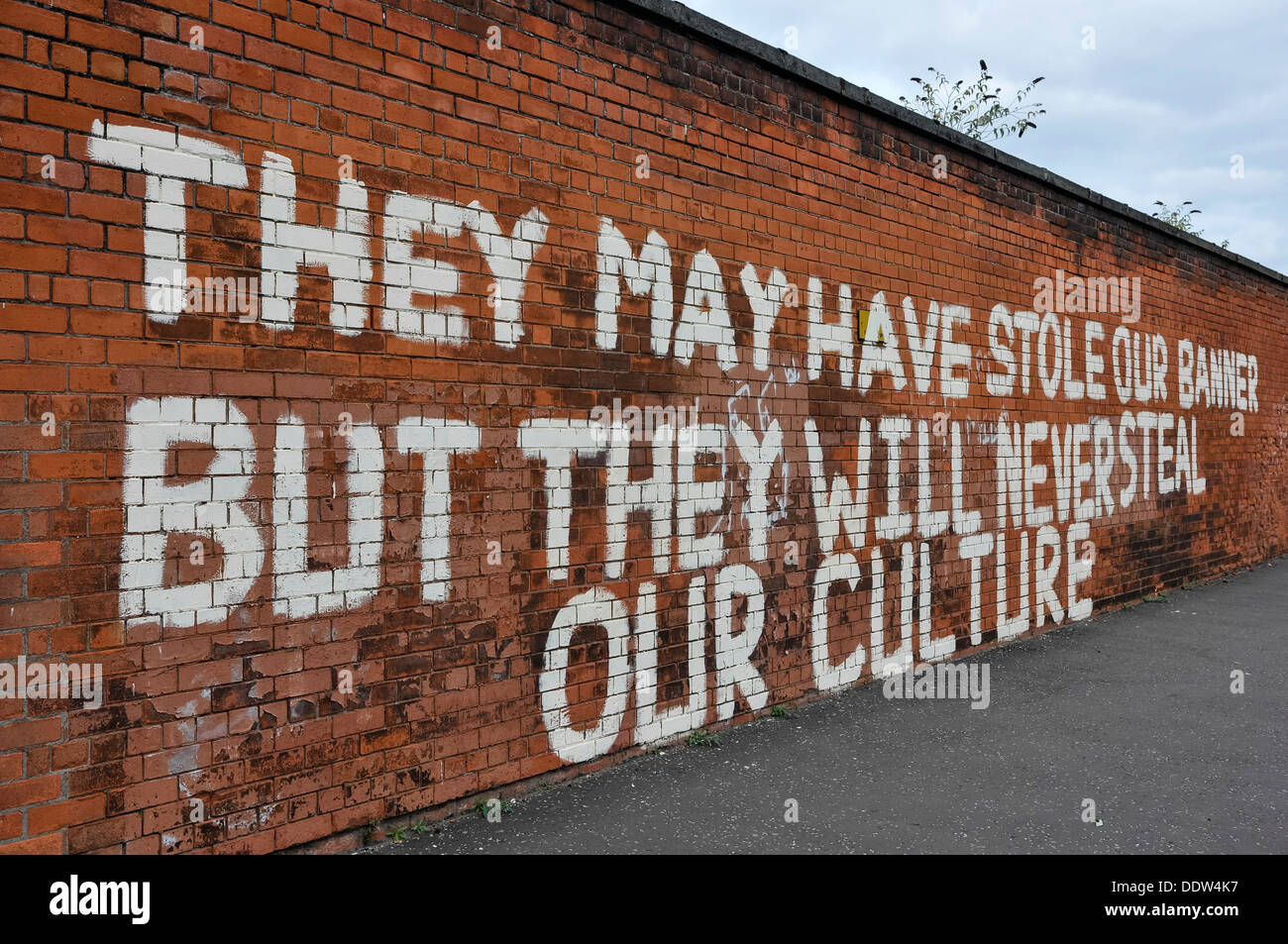 Graffiti 'They may have stole our banner, but they will never steal our culture' Stock Photo