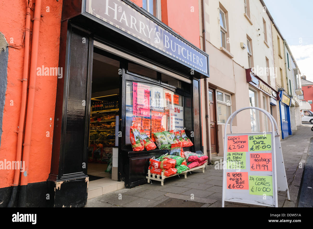 Irish village butchers shop with vegetables on display outside Stock Photo
