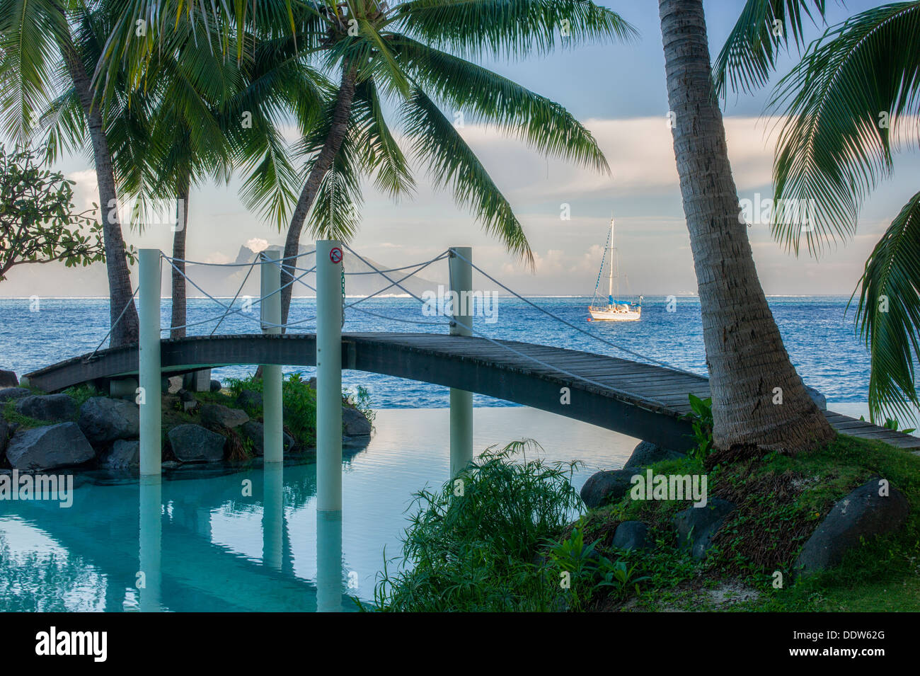 Bridge over infinity pool at the Intercontinental Tahiti hotel. Tahiti. French Polynesia Stock Photo