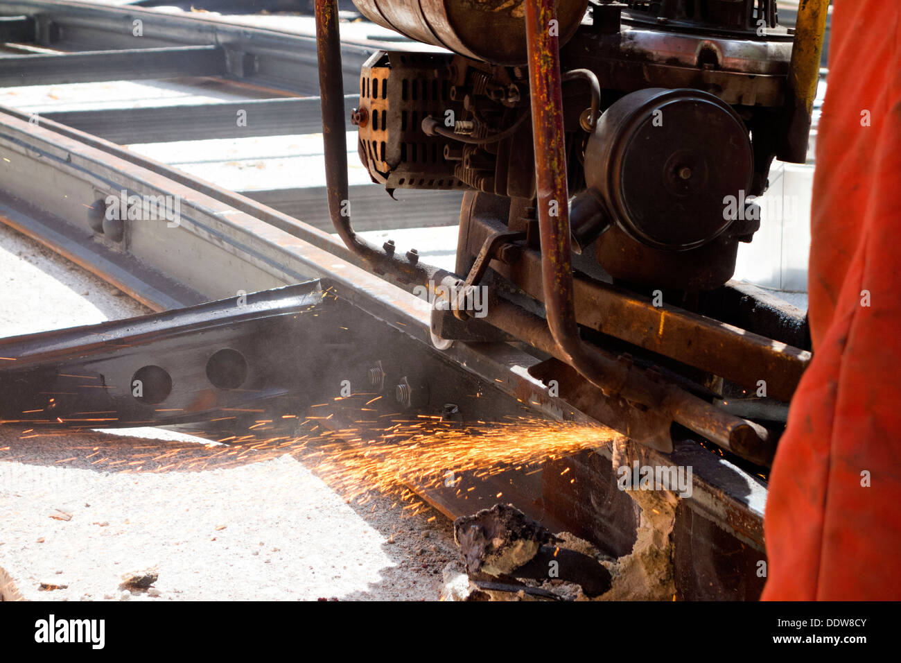 Machine grinding a Tram Line after being welded,  Munich Upper Bavaria Germany Stock Photo