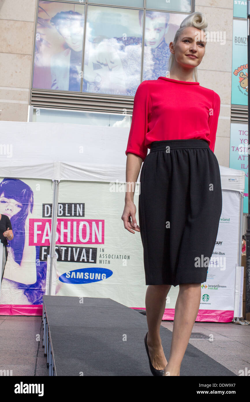 Model Teodora Sutra walks on a catwalk during the Dublin Fashion Festival. Stock Photo