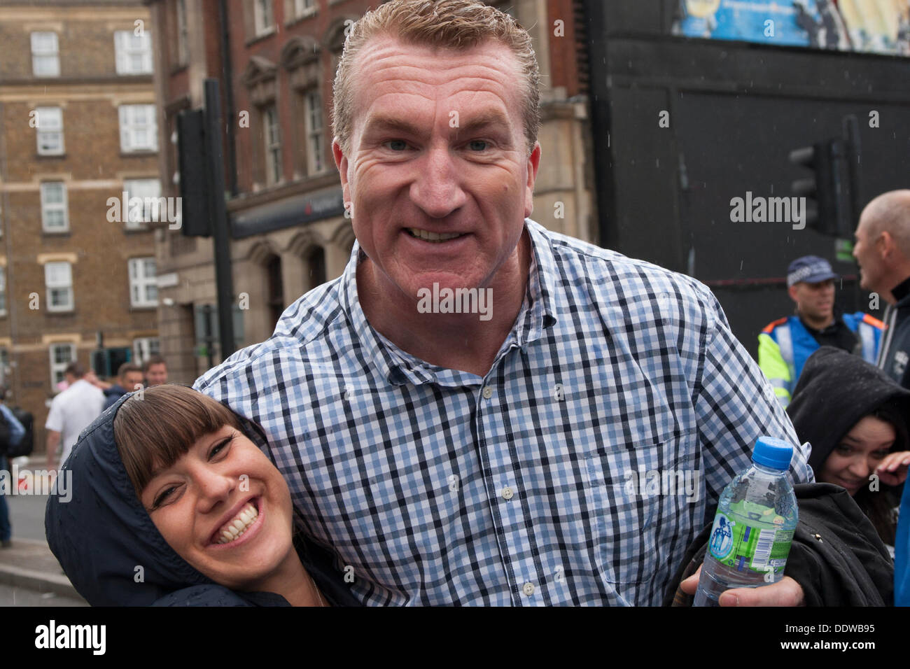 London, UK. 07th Sep, 2013. EDL co-Leader Kevin Carrol poses with a fan as several hundred English Defence League supporters marched over Tower Bridge to a short rally outside Aldgate station on the edge of the borough of Tower Hamlets. Credit:  Paul Davey/Alamy Live News Stock Photo