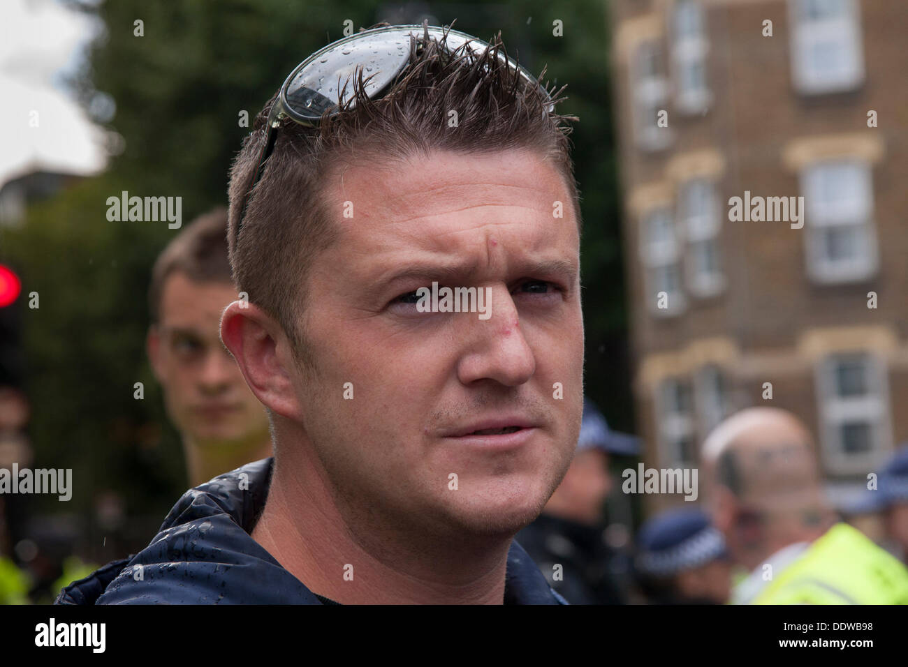London, UK. 07th Sep, 2013. EDL leader Stephen 'Tommy Robinson' Yaxley Lennon talks to the press as several hundred English Defence League supporters marched over Tower Bridge to a short rally outside Aldgate station on the edge of the borough of Tower Hamlets. Credit:  Paul Davey/Alamy Live News Stock Photo