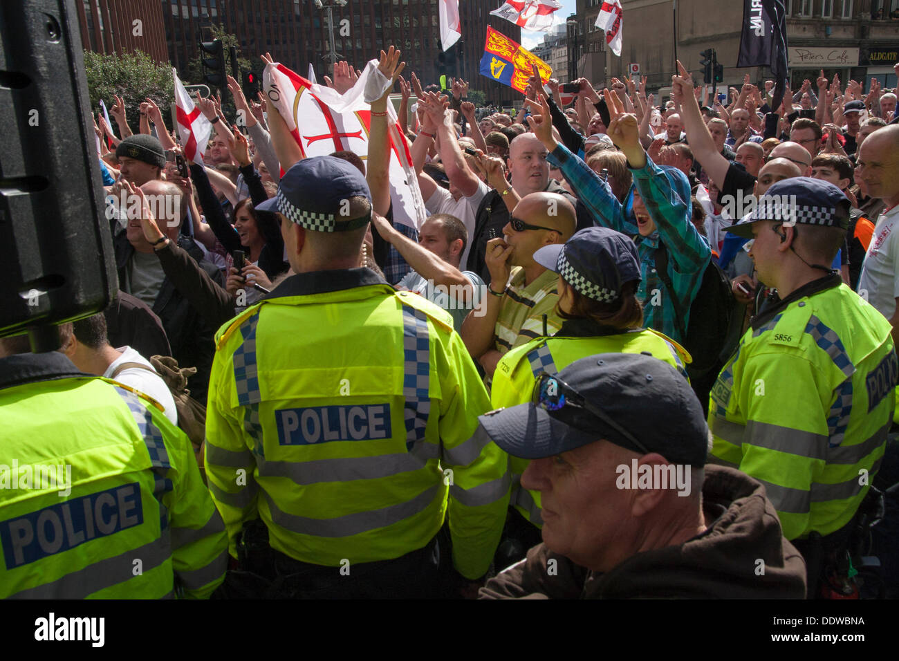 London, UK. 07th Sep, 2013. EDL activists applaud the speeches at a rally  outside Aldgate East station on the edge of the borough of Tower Hamlets. Credit:  Paul Davey/Alamy Live News Stock Photo