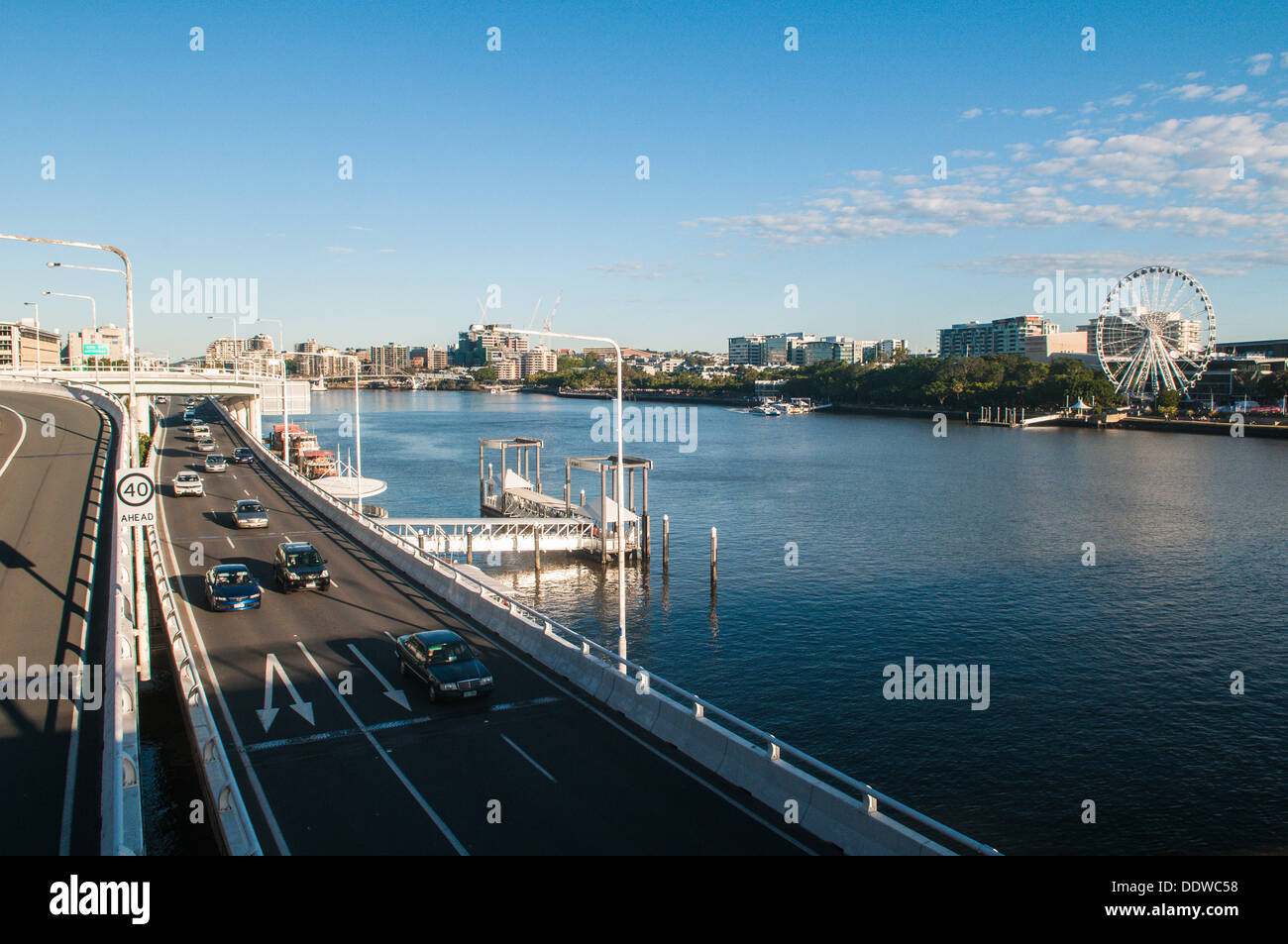 View of Riverside Expressway on left, Wheel of Brisbane across the Brisbane River, Brisbane, Queensland, Australia Stock Photo
