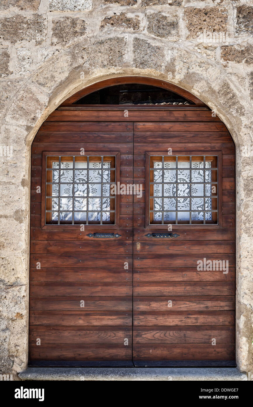 Civita Di Bagnoregio Close Up View Of Arched Doorway With Double