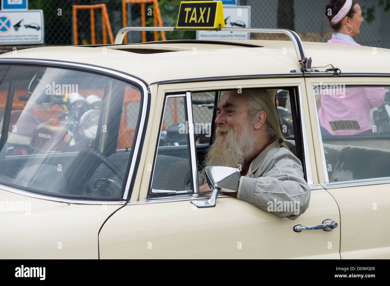 BERLIN - MAY 11: An old taxi driver, 26th Oldtimer-Tage Berlin-Brandenburg, May 11, 2013 Berlin, Germany Stock Photo