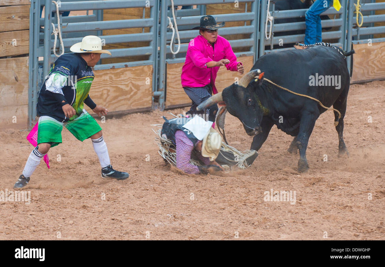 Cowboys Participates in a bull riding Competition at the 92nd annual