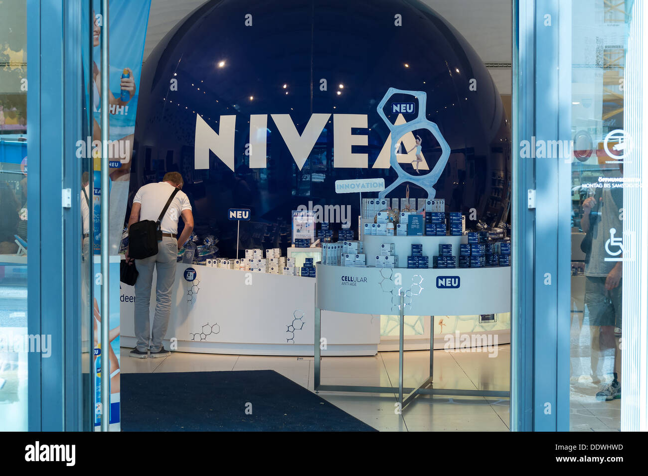 Nivea Shop on Unter den Linden. Nivea is a global skin-and body-care brand  that is owned by the German company Beiersdorf Stock Photo - Alamy