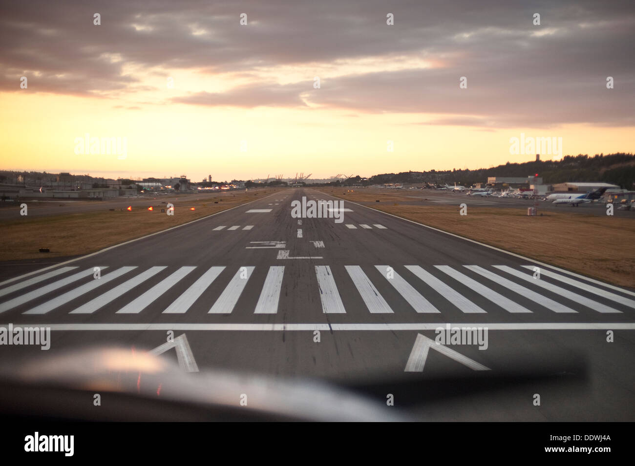 Landing tarmac at Boeing Field at sunset Stock Photo - Alamy
