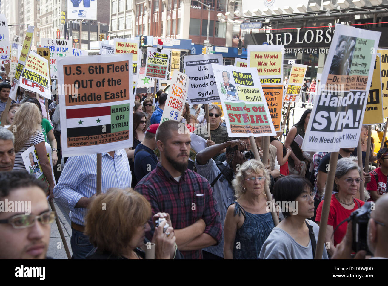 New York City, USA. 07th Sept, 2013. New Yorkers speak out loud and clear to President Obama, as they march down Broadway,  'that we don't want another useless war that will only cause more death and destruction and breaks international law.' Credit:  David Grossman/Alamy Live News Stock Photo