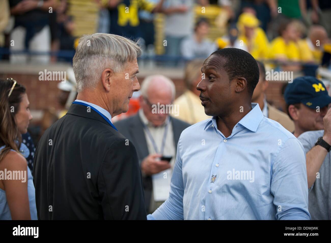 Ann Arbor, Mi, USA. 7th Sep, 2013. September 7, 2013: Mark Harmon and Desmond Howard talk on the sidelines during the Notre Dame Fighting Irish and the Michigan Wolverines game at Michigan Stadium, Ann Arbor, Michigan Seth Graves/CSM/Alamy Live News Stock Photo