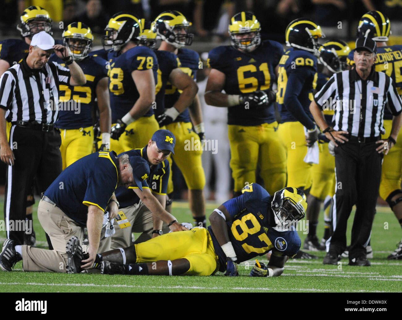 Ann Arbor, Mi, USA. 7th Sep, 2013. September 7, 2013: Devin Funchess #87 of Michigan is injured during the NCAA Football game between the Notre Dame Fighting Irish and the Michigan Wolverines at Michigan Stadium, Ann Arbor, Michigan Seth Graves/CSM/Alamy Live News Stock Photo