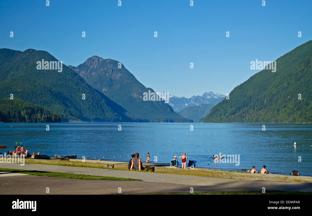 People enjoying beautiful Alouette Lake, beach, and mountains in British Columbia, Canada. Golden Ears Provincial Park. Stock Photo