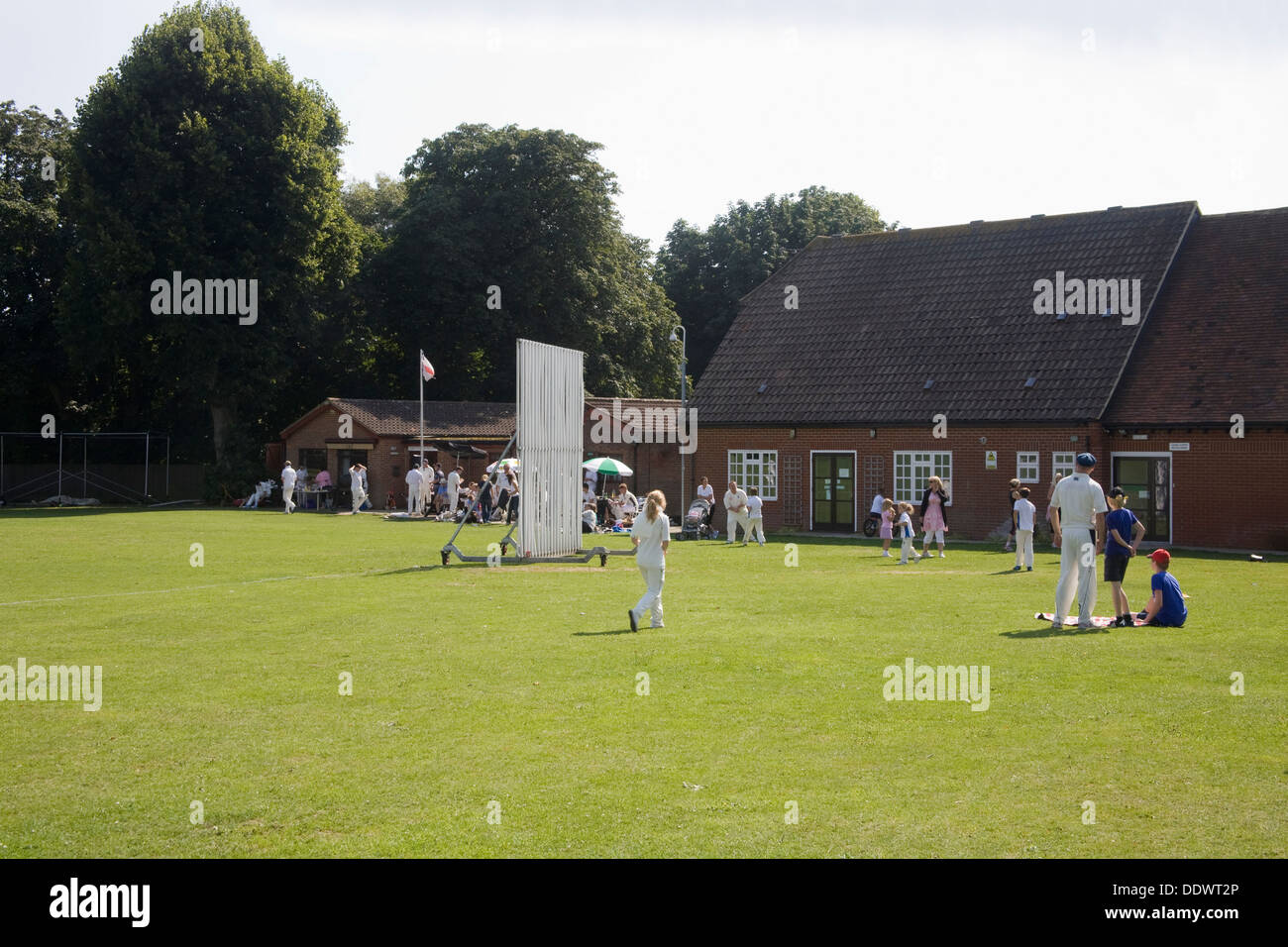 Littlebourne Kent England UK Spectators watching cricket match at recreation club featuring village team formed in 1860 Stock Photo