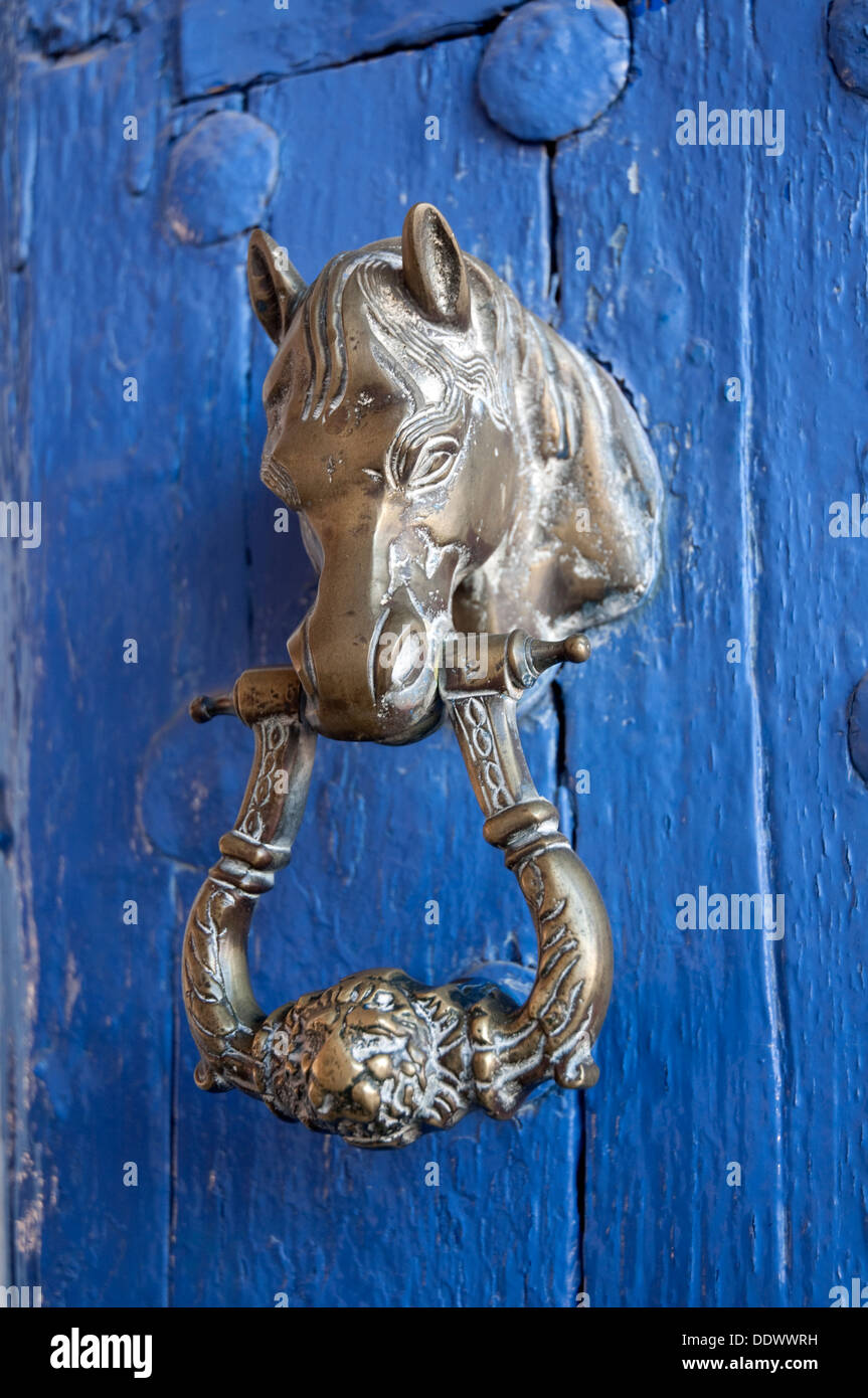 Horse-shaped knocker. Puerto Lapice, Ciudad Real province, Castilla La Mancha, Spain. Stock Photo