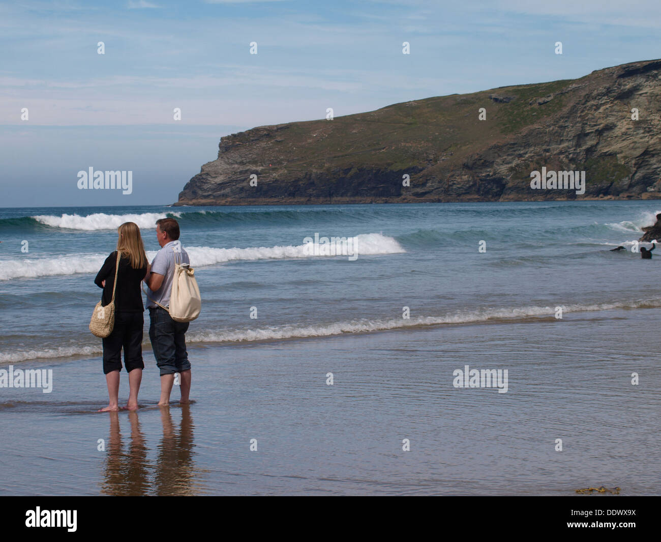 Middle aged couple at the beach, Trebarwith Strand, Cornwall, UK 2013 Stock Photo