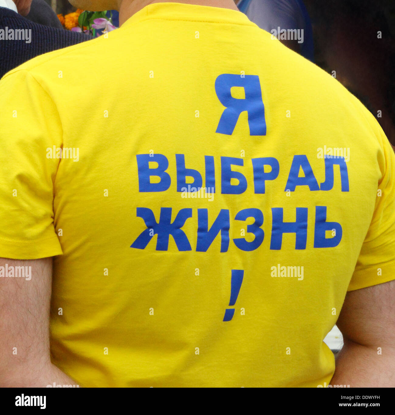 Yellow knitted men t-shirt with the inscription " I chose life! " Stock Photo
