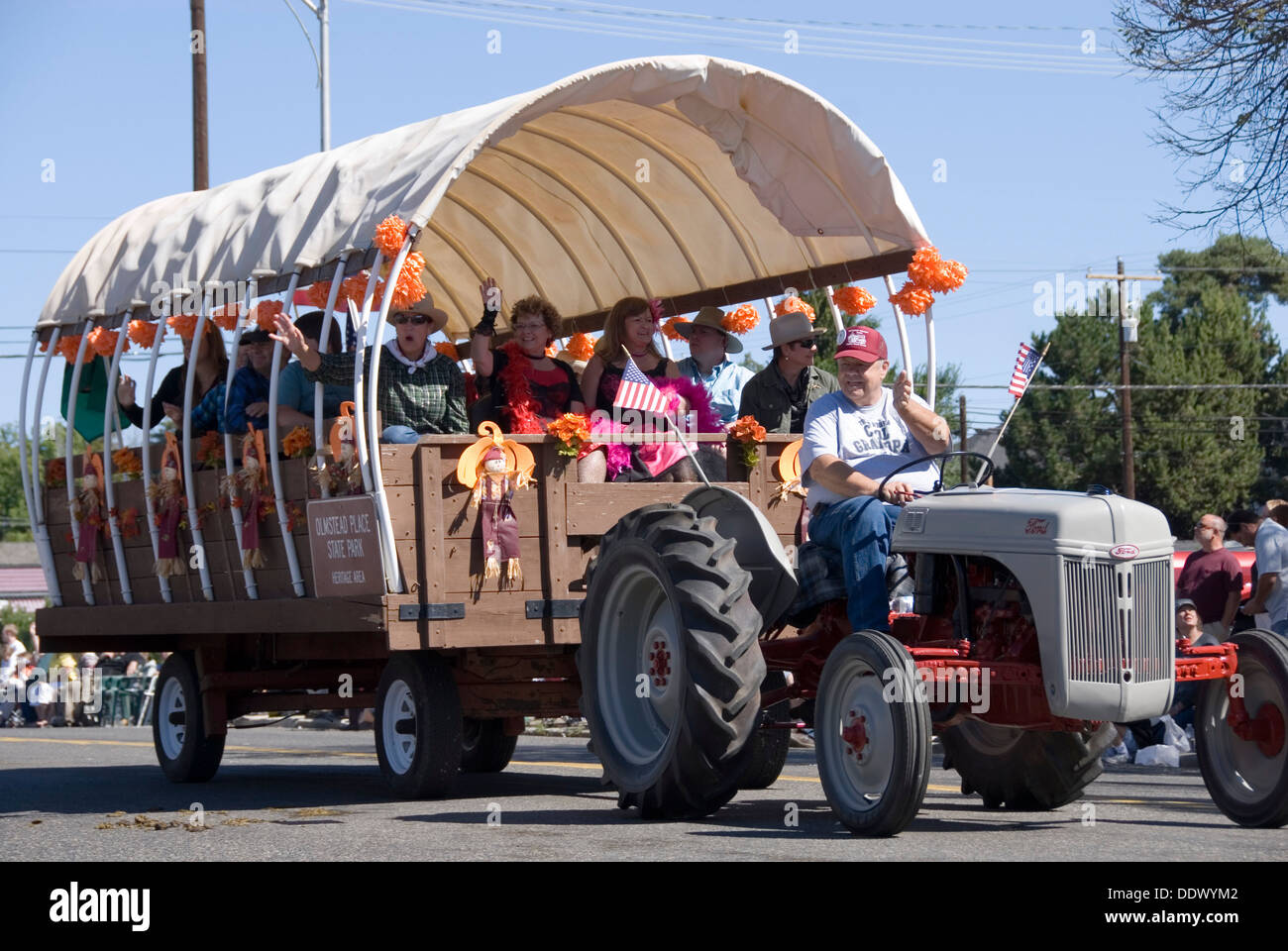 Hayride fun: people in a covered wagon trailer pulled by tractor laughing and waving, Ellensburg Rodeo Western Parade, WA, USA Stock Photo - Alamy Hayride fun: people in a covered wagon trailer pulled by tractor laughing and waving, Ellensburg Rodeo Western Parade, WA, USA Stock Photo - Alamy