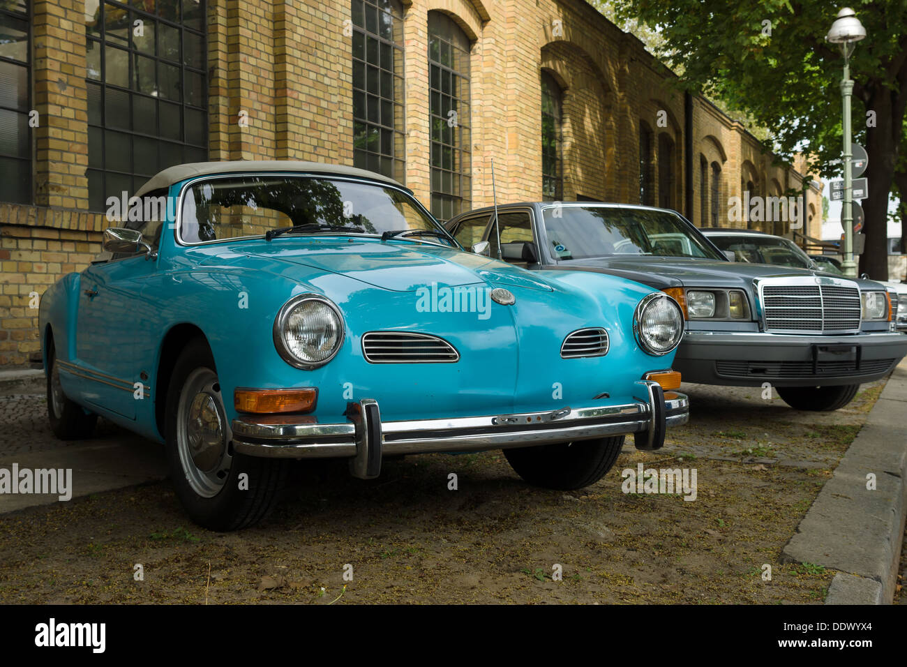Car Volkswagen Karmann Ghia (foreground) and the Mercedes-Benz W201 (background) Stock Photo