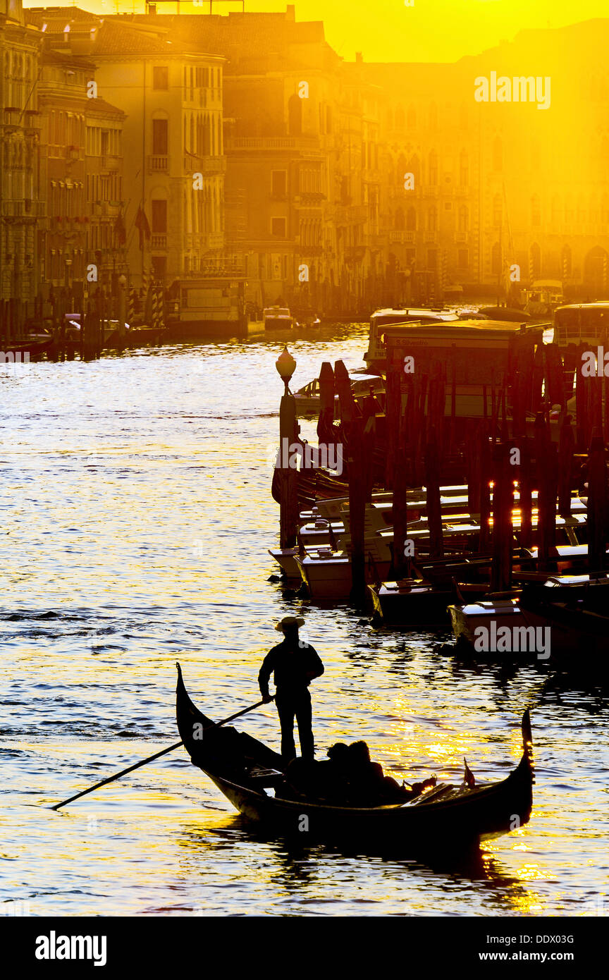 Europe, Italy, Veneto, Venice, classified as World Heritage by UNESCO. Gondola in the Grand Canal at sunset. Stock Photo