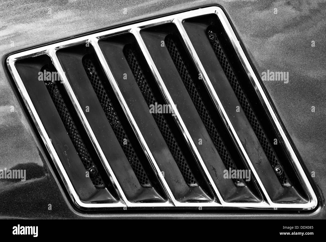 The ventilation grille of the Audi 100 (C1) Coupe S, close-up, (black and white) Stock Photo