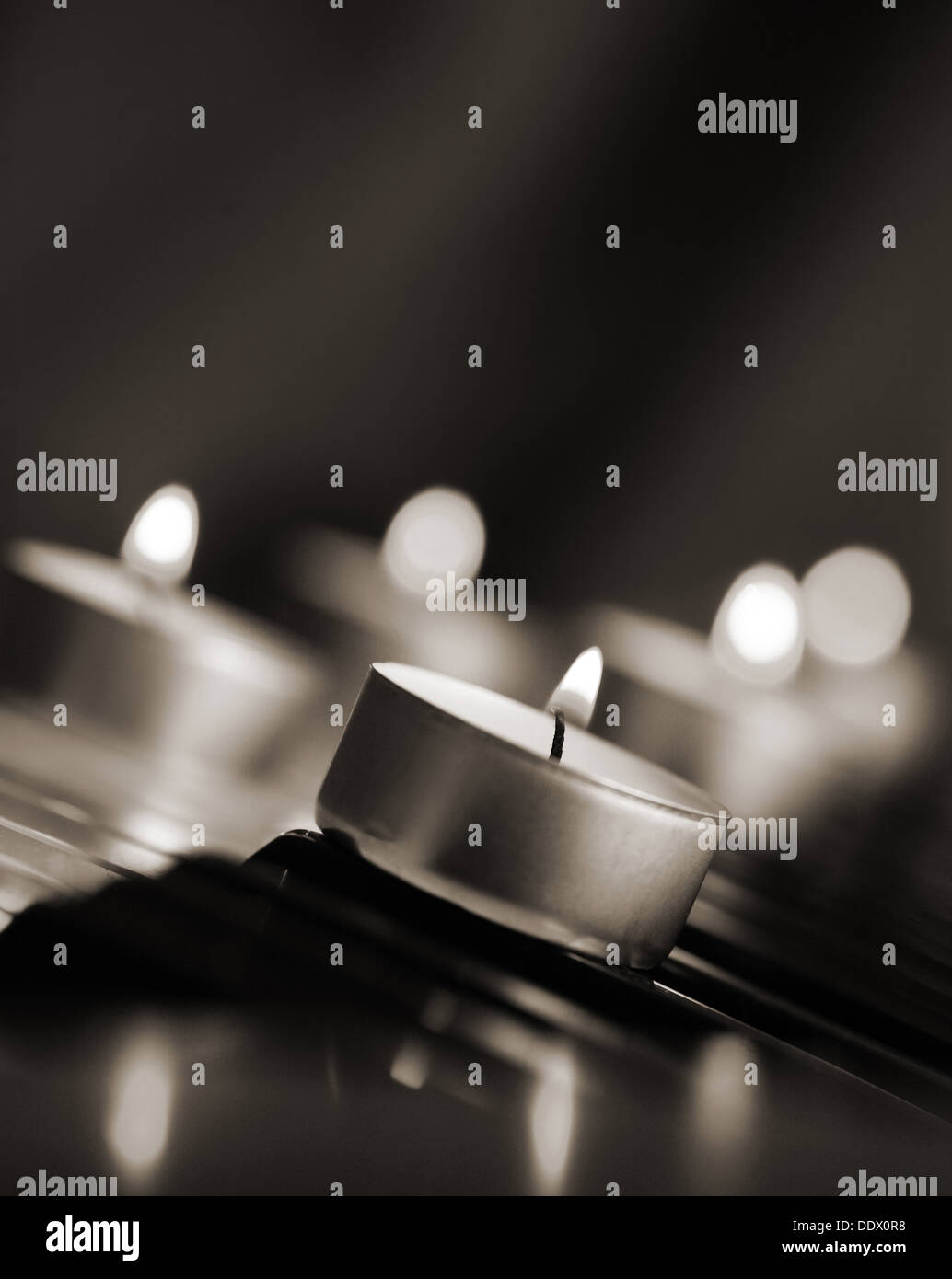 monochrome image, burning candles Stock Photo - Alamy