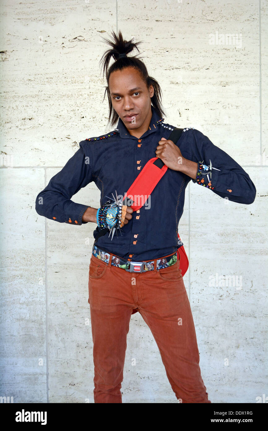 Portrait of stylist Andre wearing a pony tail and extreme jewelry at Fashion Week at Lincoln Center in New York City Stock Photo