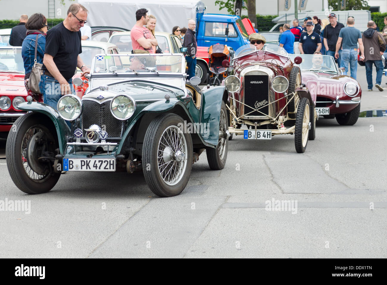 French retro car Amilcar (Ecurie SideCar) and English Retro cars Riley MPH 15-6 in 1935, Stock Photo