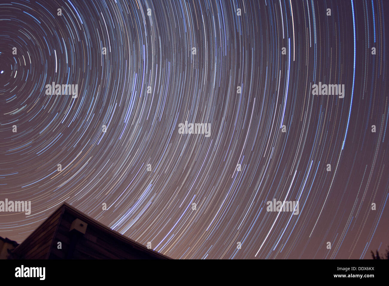 Star trails around Polaris, the North Pole Star in a 4hr exposure image Stock Photo