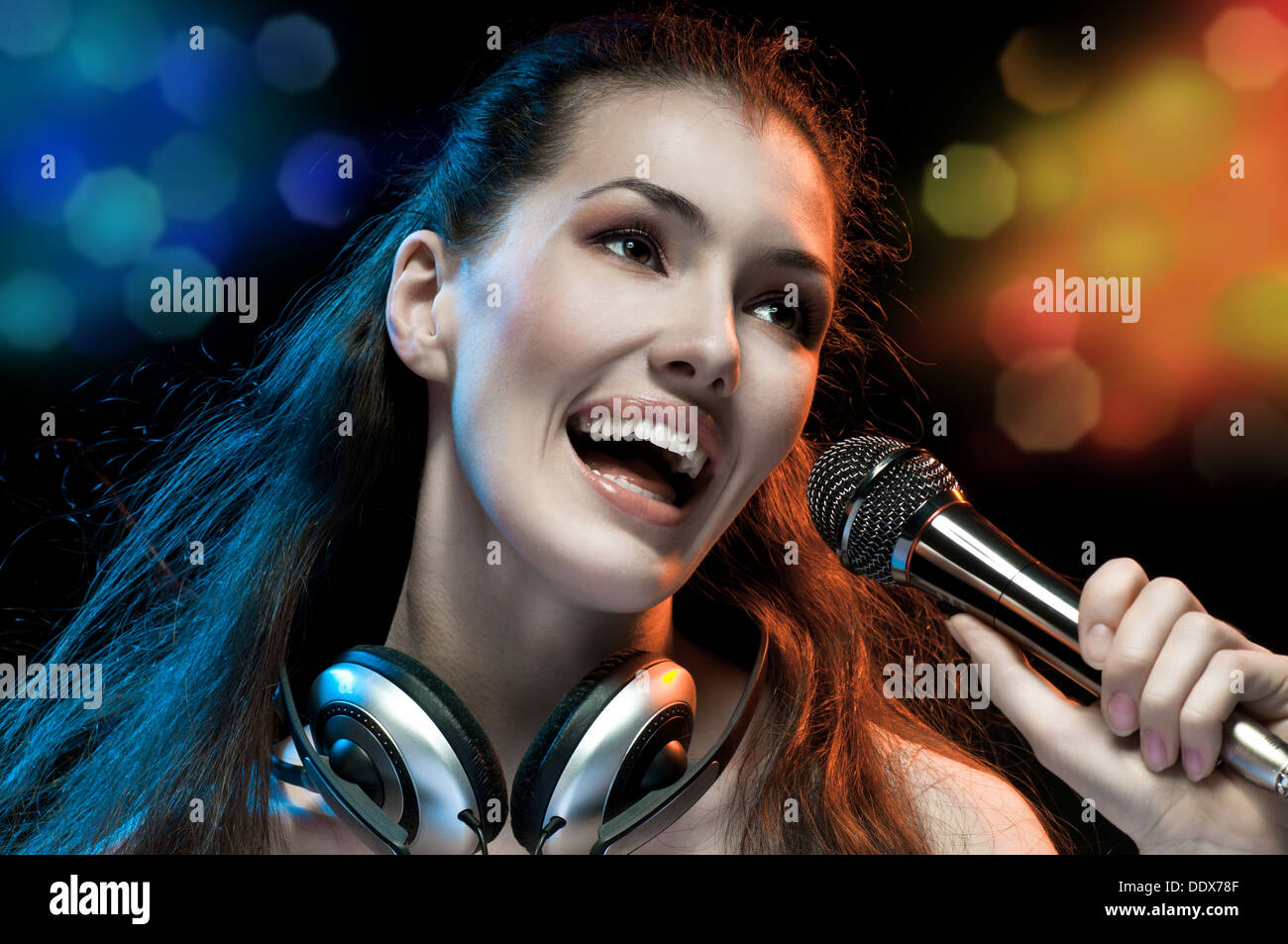 pretty girl singing at the revelry party Stock Photo Alamy