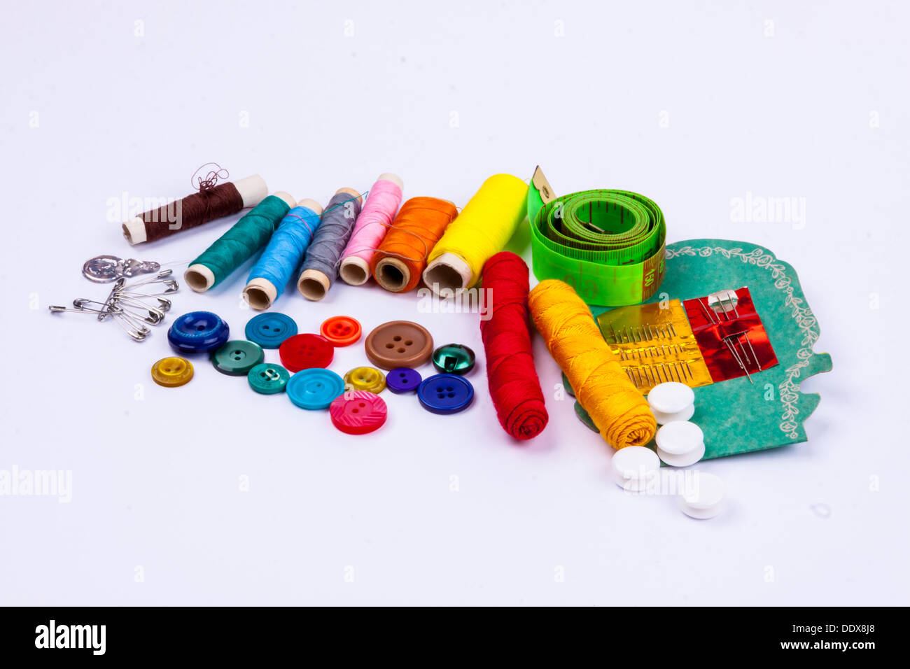 Sewing accessories white background Stock Photo Alamy