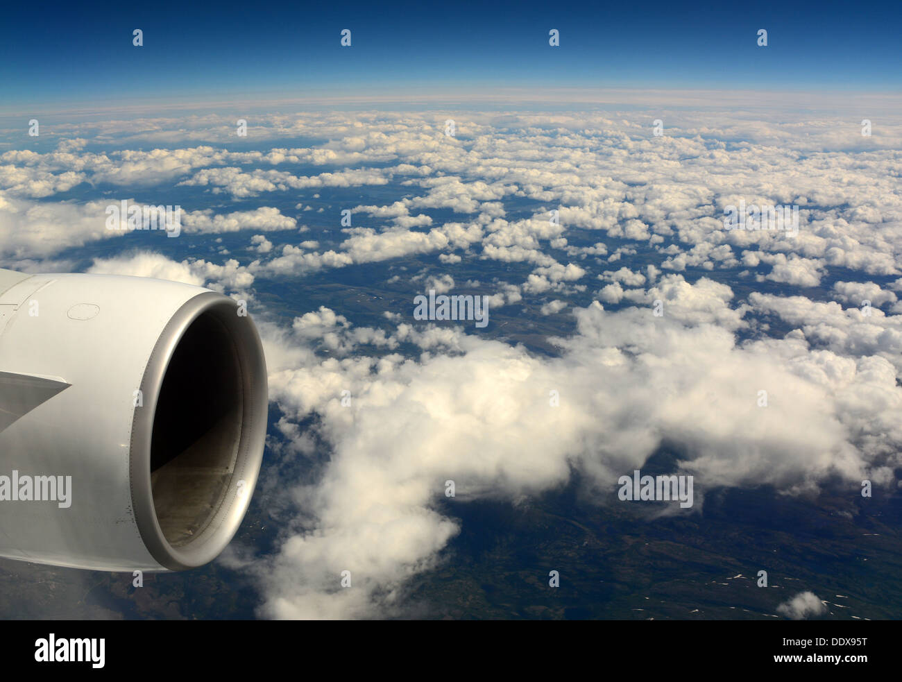Airplane engine in mid air Stock Photo