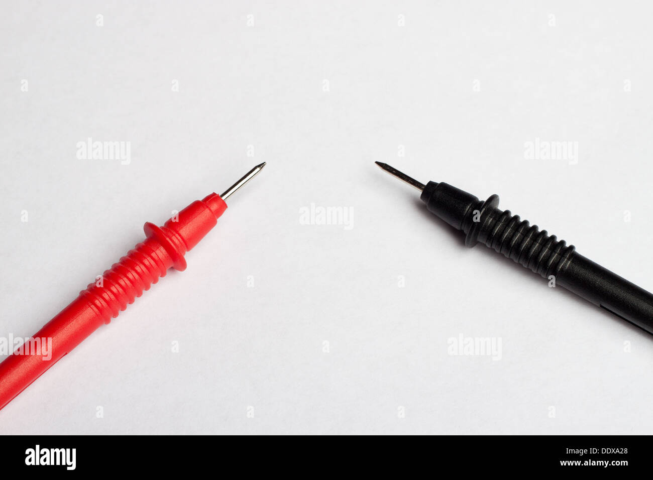 Positive and negative multimeter probes Stock Photo